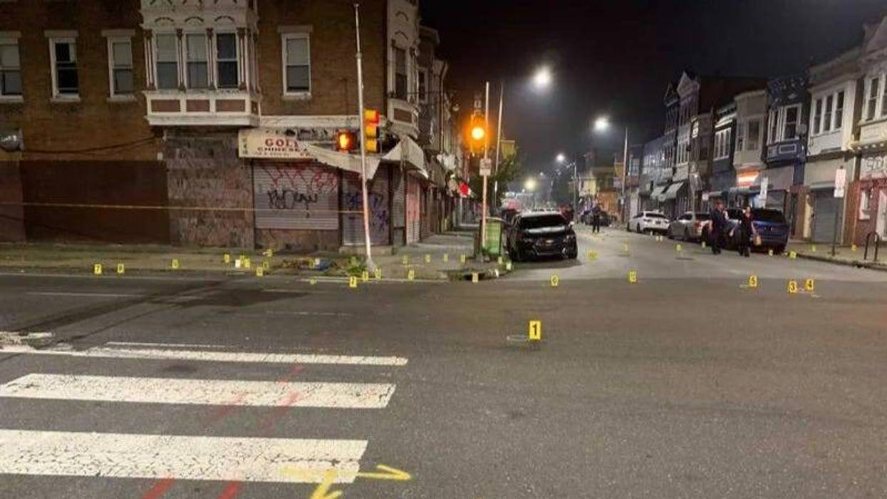 More than 100 bullets were fired into a crowd of people at a West Philadelphia Fourth of July cookout in 2021. Police markers filled the street the following morning.