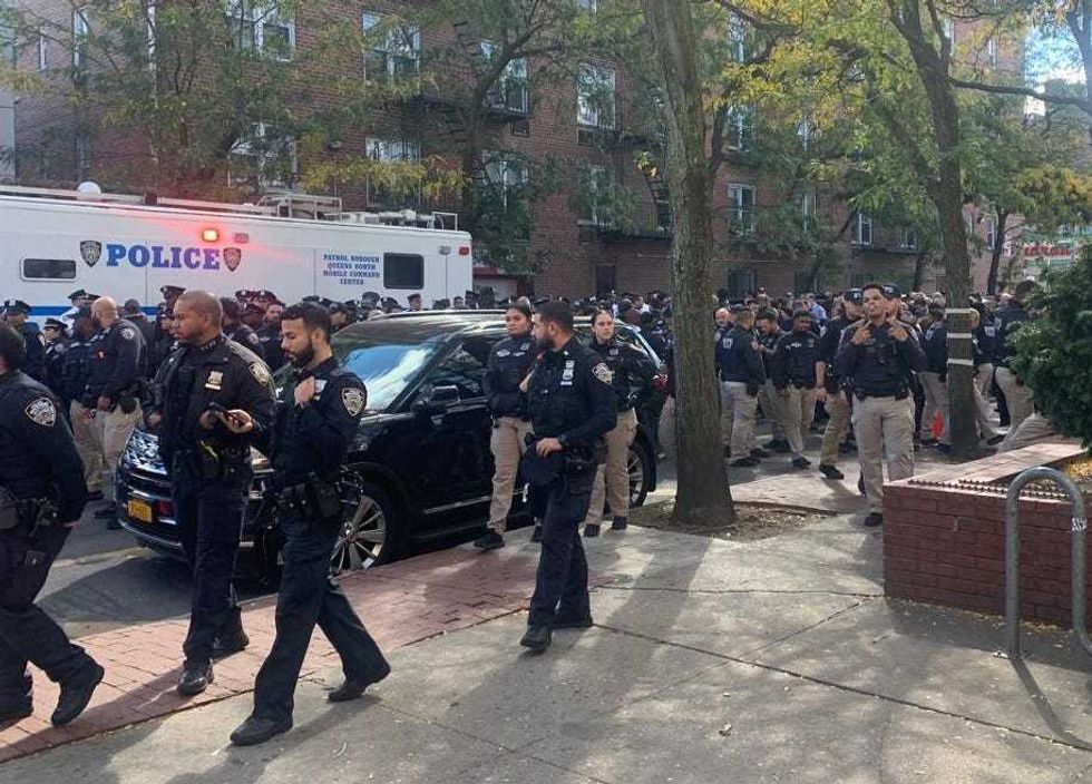 More than 200 police officers were seen along Roosevelt Avenue, including members of the New York State Police