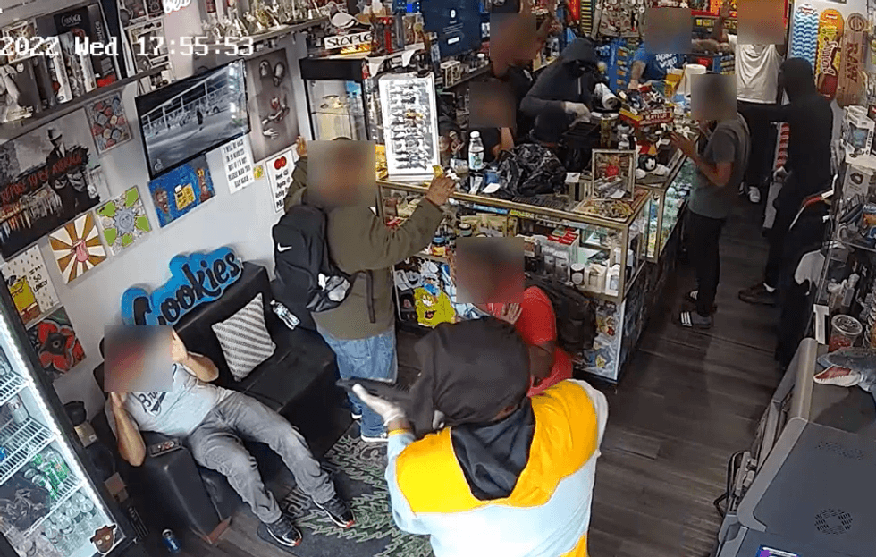 More than a half-dozen people were in the store at the time of the robbery