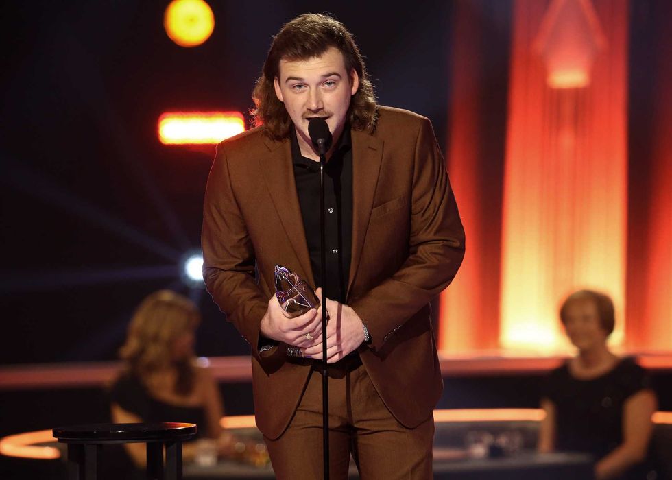 Morgan Wallen accepts and award onstage during the The 54th Annual CMA Awards at Nashville