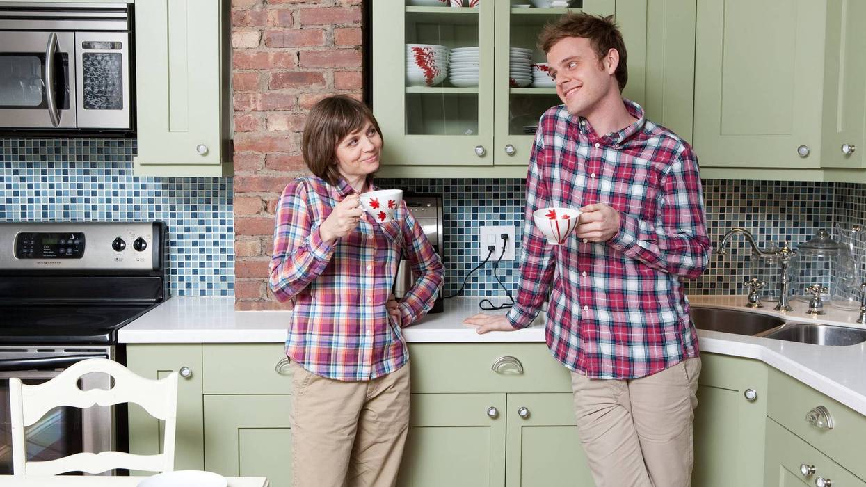 Mother and son wear matching plaid shirts