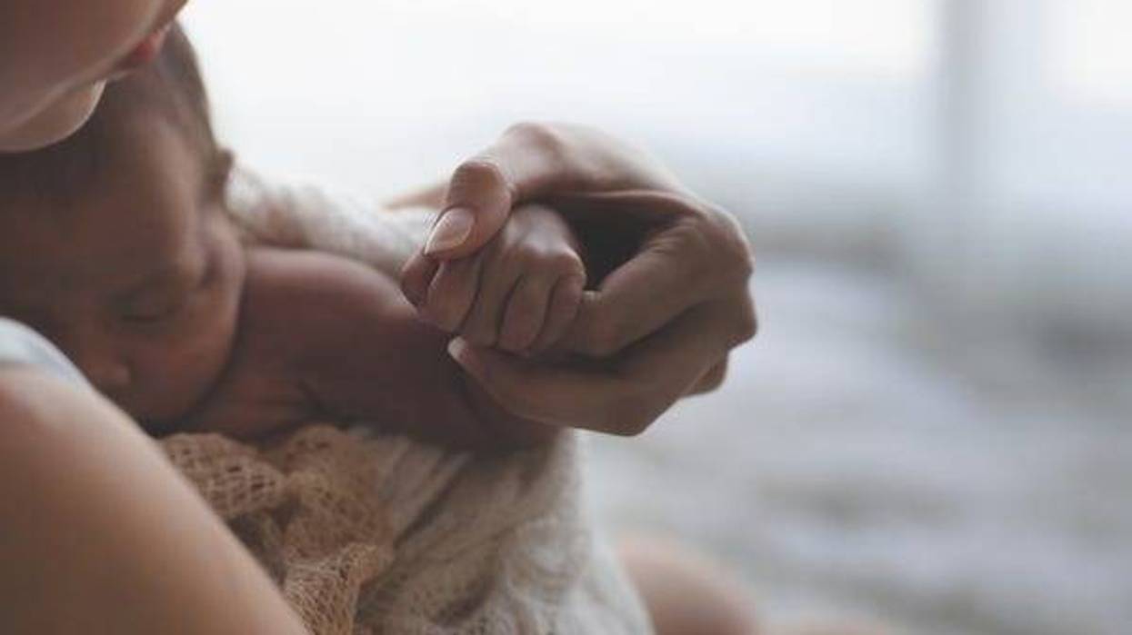 Mother holding newborn