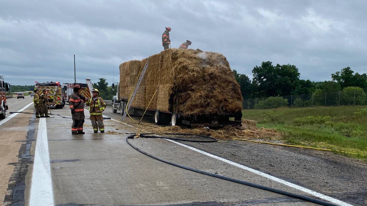 Motorists traveling out in West Michigan were told to steer clear of a major freeway in Kent County after a tractor trailer loaded down with hay suddenly caught fire on Saturday morning.