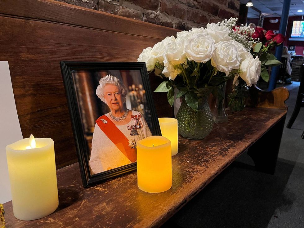 Mourners gather at Wilmington pub before dawn to watch Queen Elizabeth