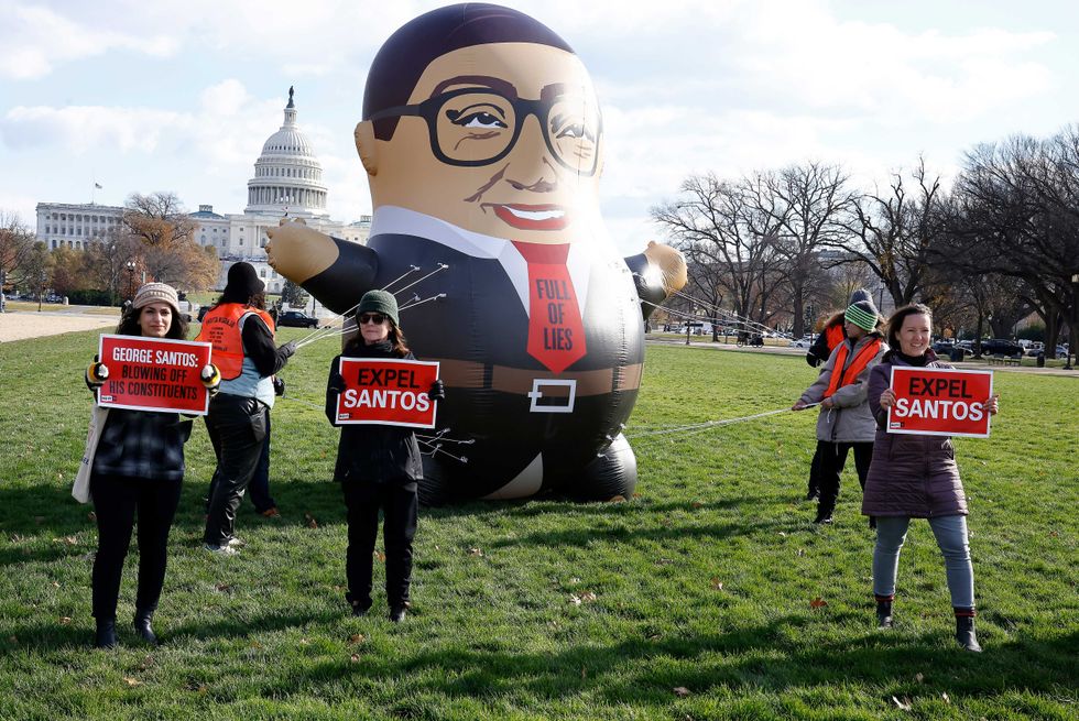 MoveOn debuts a 15-foot-tall inflatable of George Santos ahead of a possible vote to expel Santos from Congress on Capitol Hill on Nov. 28, 2023 in Washington, DC
