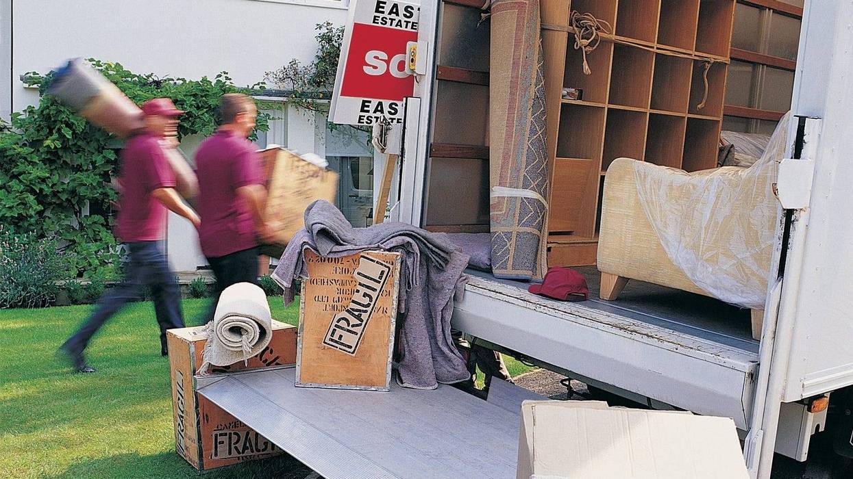 Movers Unloading Moving Van