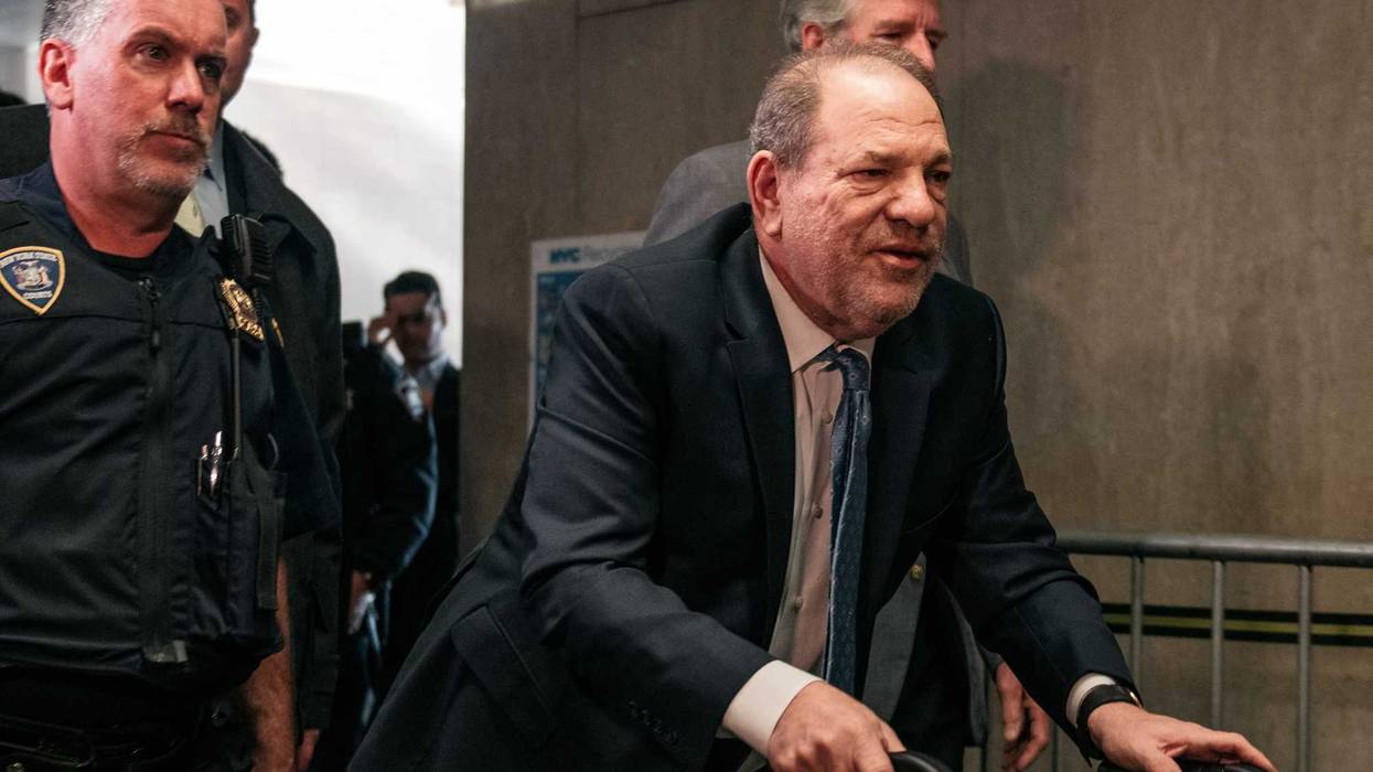 Movie producer Harvey Weinstein (R) enters New York City Criminal Court on February 24, 2020 in New York City