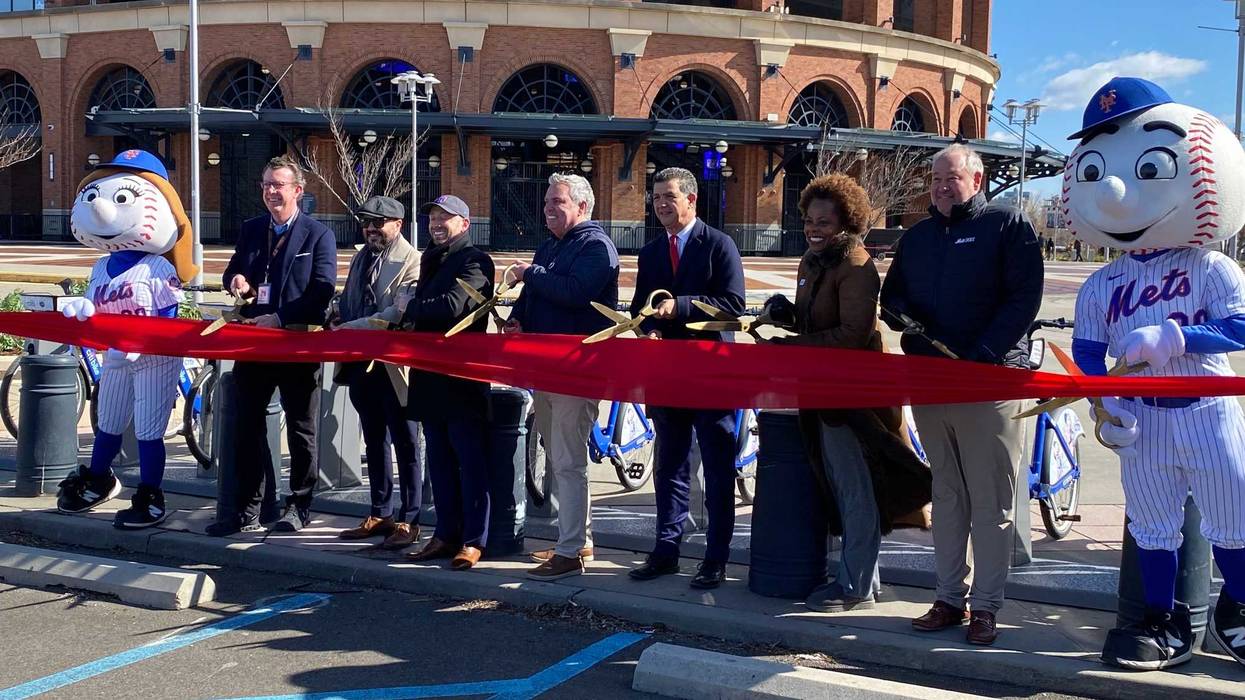 Mr. and Mrs. Met, along with NYC Dept. of Transportation commissioner Ydanis Rodríguez (4th from right), NYC councilor Francisco Moya (third from left) and executives from the Mets, Citi and Lyft, take part in a ribbon-cutting ceremony marking the debut of Citi Bike at Citi Field on March 21, 2024.