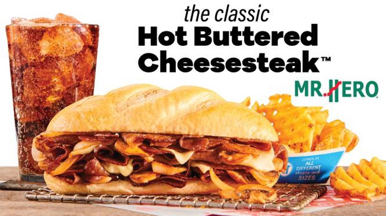 Mr. Hero's classic Hot Buttered Cheesesteak sandwich, golden waffle fries, and iced soda.