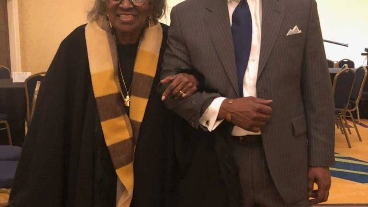 Mrs. Juanita Abernathy is seen being escorted by her son Kwame on Feb. 16, 2019 during a Black History program in Morrow GA