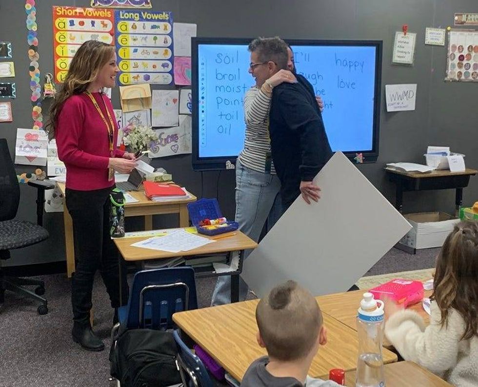 Ms Evans hugging Rocky