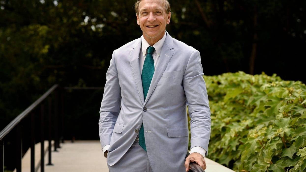 MSU President Samuel L. Stanley Jr., M.D., pictured Monday, Aug. 23, 2021, on the back porch of the Cowles House on the campus of Michigan State University.