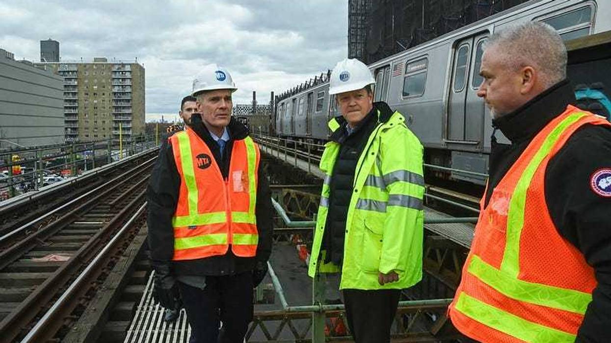 MTA Chief Safety Officer Patrick Warren and NYCT President Richard Davey at the scene of a derailed F train near the Neptune Avenue station on Wednesday.