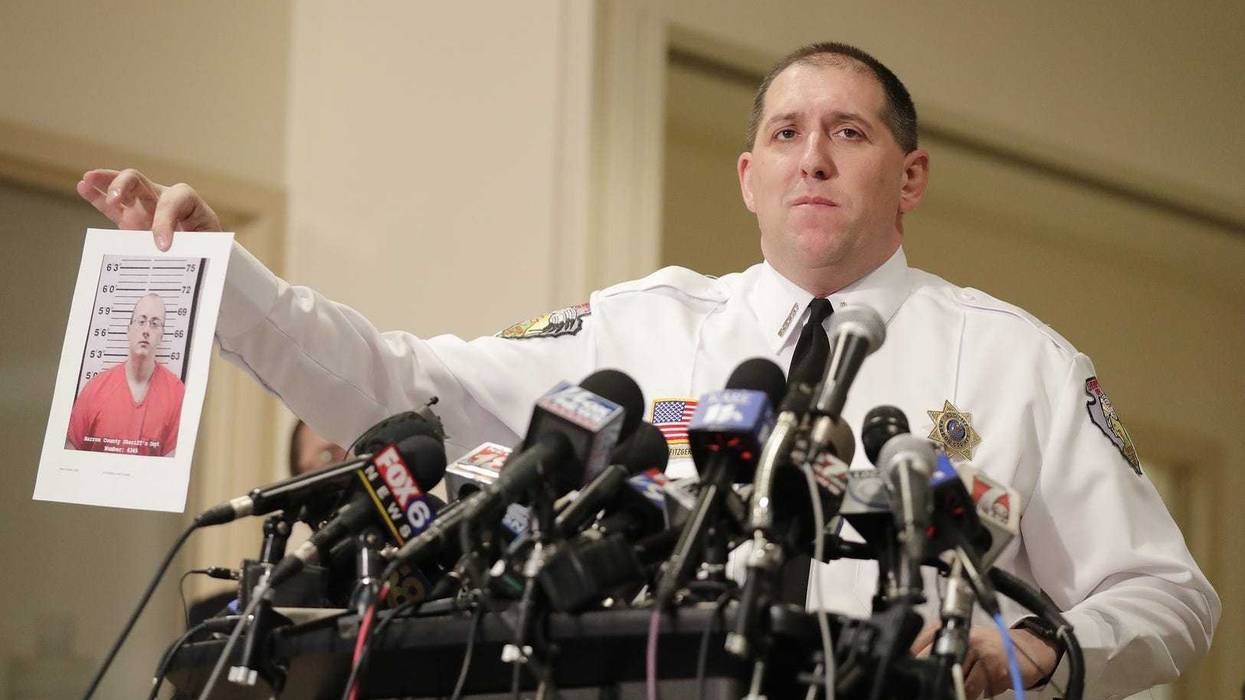 Mug shot of Jake Patterson is shown by sheriff Chris Fitzgerald