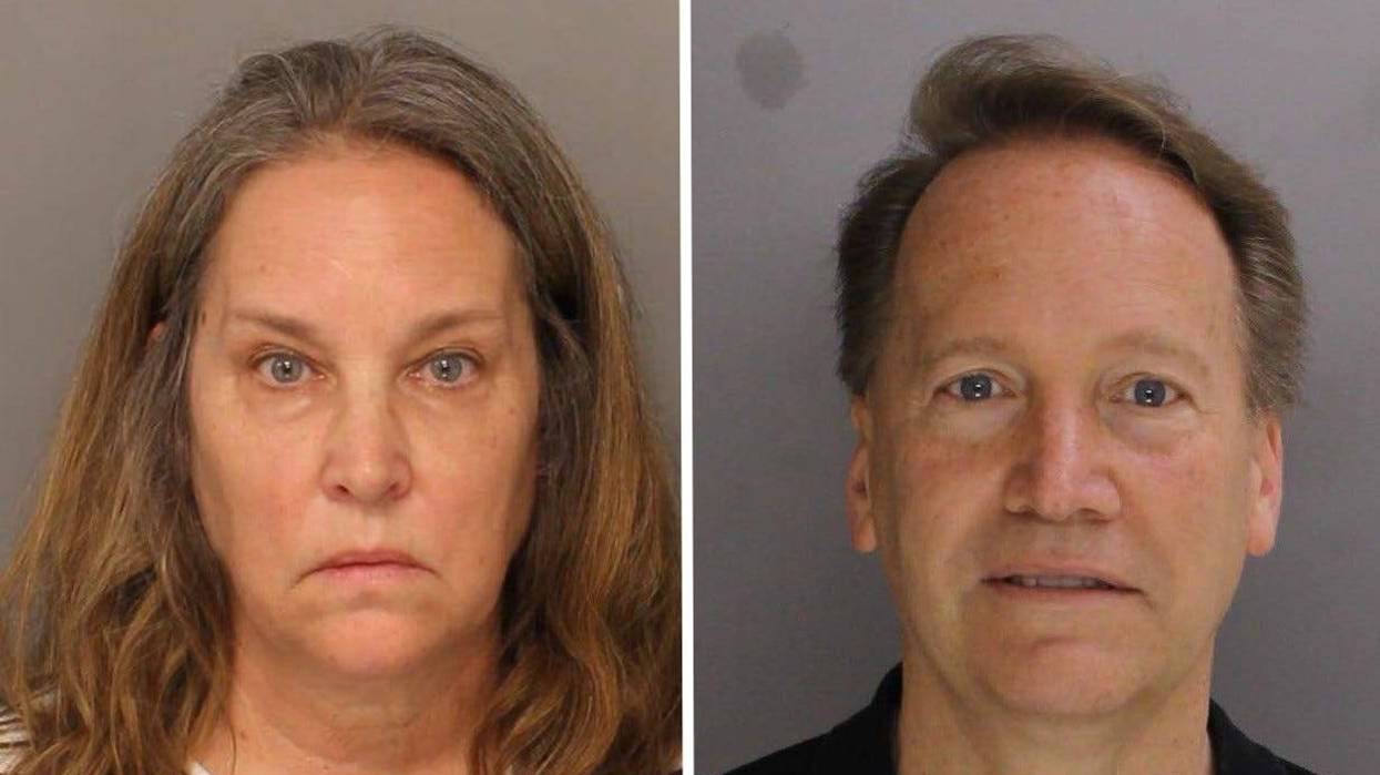 Mugshots of Leticia and Mark Cox