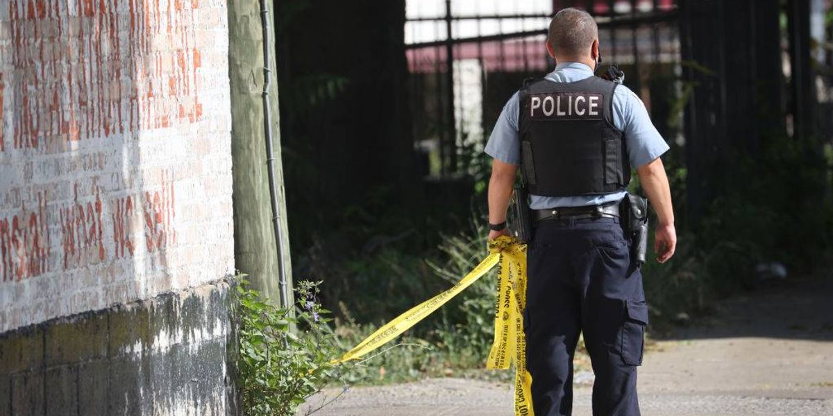 Two people were killed and a woman left critically injured in a drive-by shooting on Chicago's south side