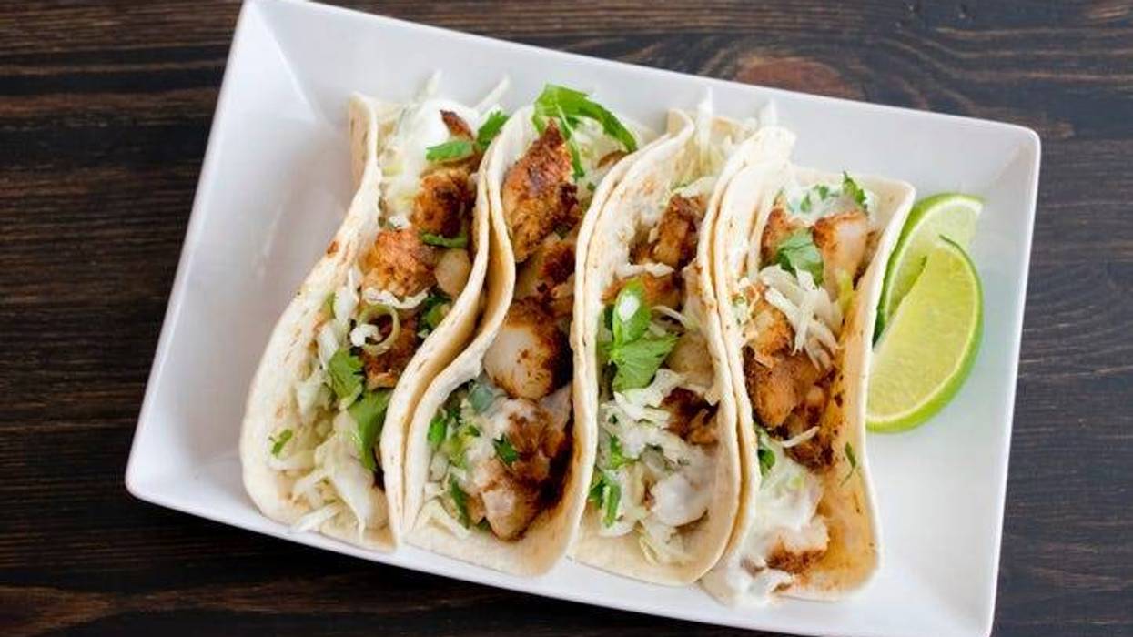 multiple tacos on a plate