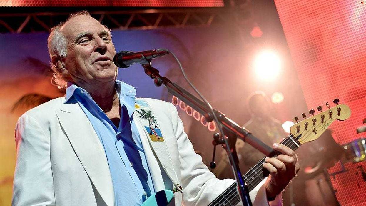 Musician Jimmy Buffett performs at the after party for the premiere of Universal Pictures' "Jurassic World" at Hollywood & Highland on June 9, 2015 in Los Angeles, California. (Photo by Kevin Winter/Getty Images)