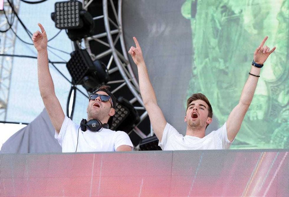 Musicians Alex Pall (L) and Andrew Taggart of The Chainsmokers perform onstage