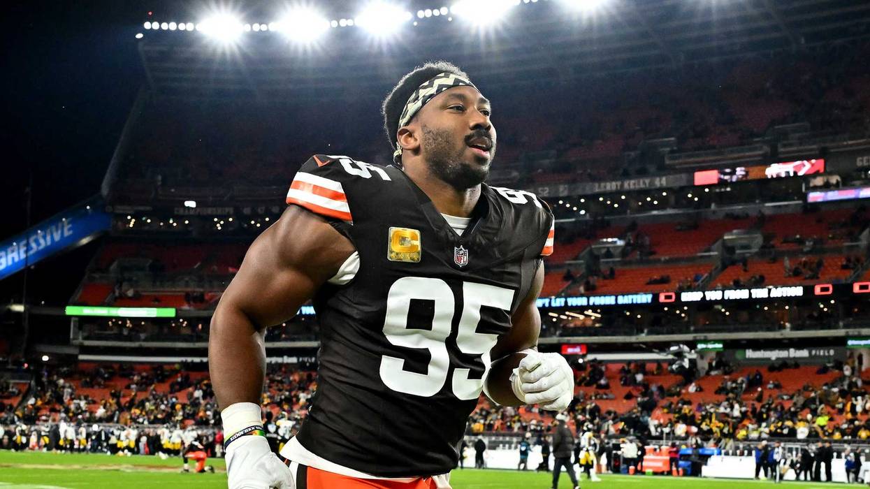 Myles Garrett #95 of the Cleveland Browns runs off the field prior to the game against the Pittsburgh Steelers at Huntington Bank Field on November 21, 2024 in Cleveland, Ohio.