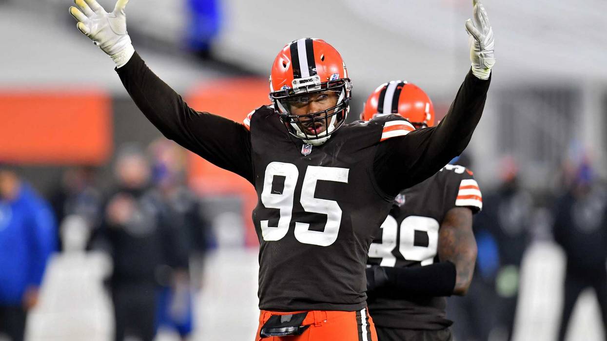 Myles Garrett of the Cleveland Browns pumps up the crowd in the fourth quarter against the Indianapolis Colts