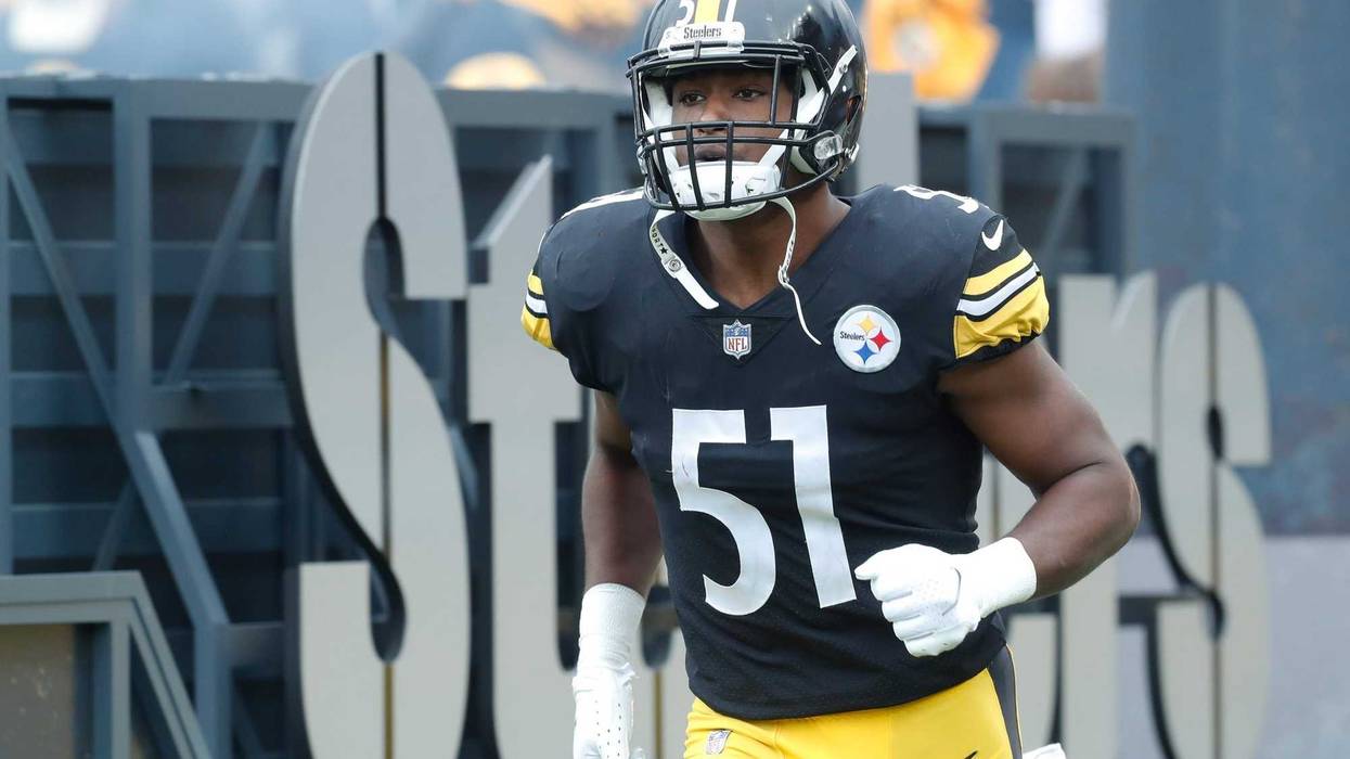 Myles Jack entering the field