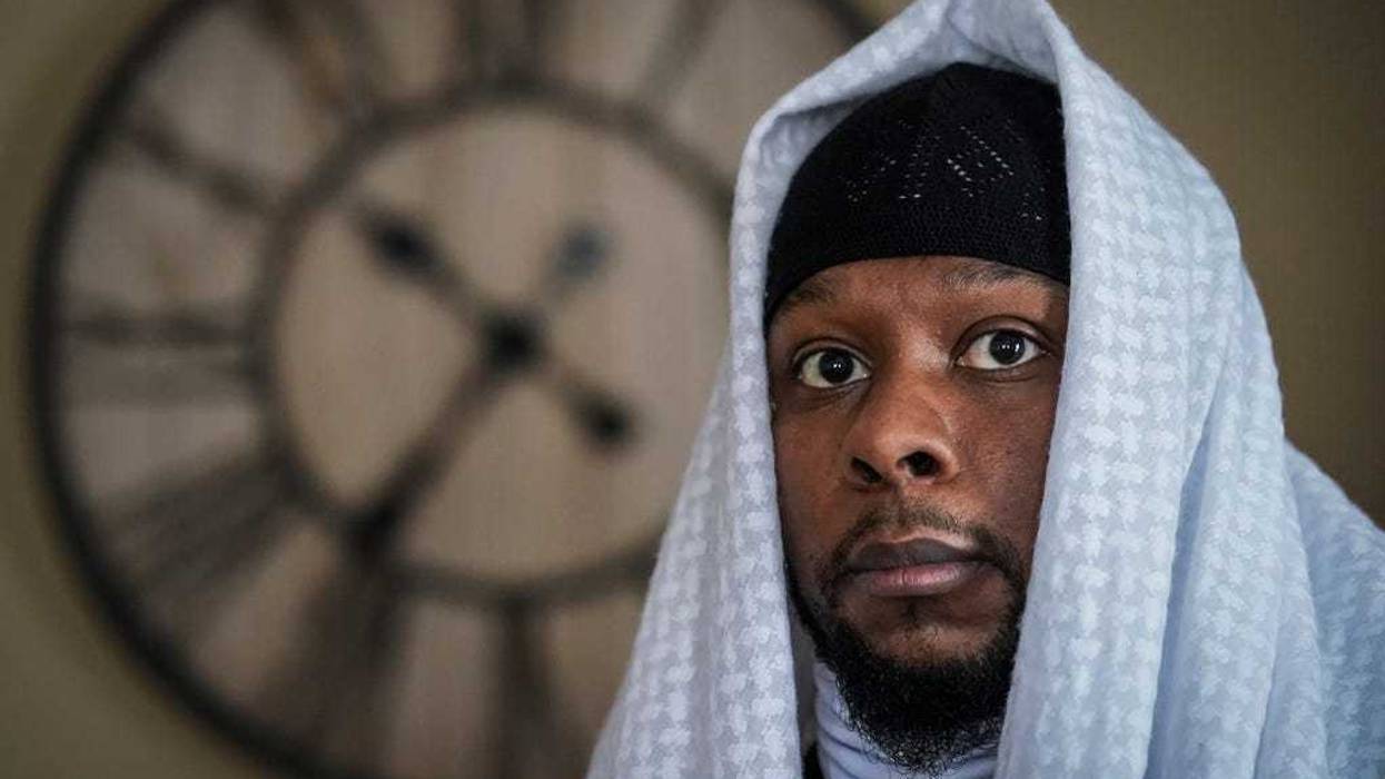 Myon Burrell poses for a photo at his home in Minneapolis, Dec. 17, 2020, two days after his release from prison.