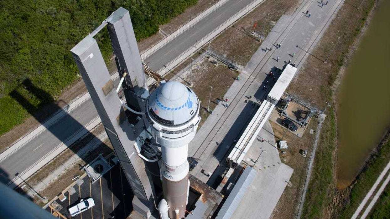 n this handout photo provided by NASA, a United Launch Alliance Atlas V rocket with Boeing's CST-100 Starliner spacecraft aboard is rolled out of the Vertical Integration Facility to the launch pad at Space Launch Complex 41 ahead of the Orbital Flight Test-2 (OFT-2) mission, on May 18, 2022 at Cape Canaveral Space Force Station in Cape Canaveral, Florida. Boeing's Orbital Flight Test-2 will be Starliner's second un-crewed flight test and will dock with the International Space Station as part of NASA's Commercial Crew Program. The mission, currently targeted for launch at 6:54 p.m. ET on May 19, will serve as an end-to-end test of the system's capabilities. (Photo by Joel Kowsky/NASA via Getty Images)