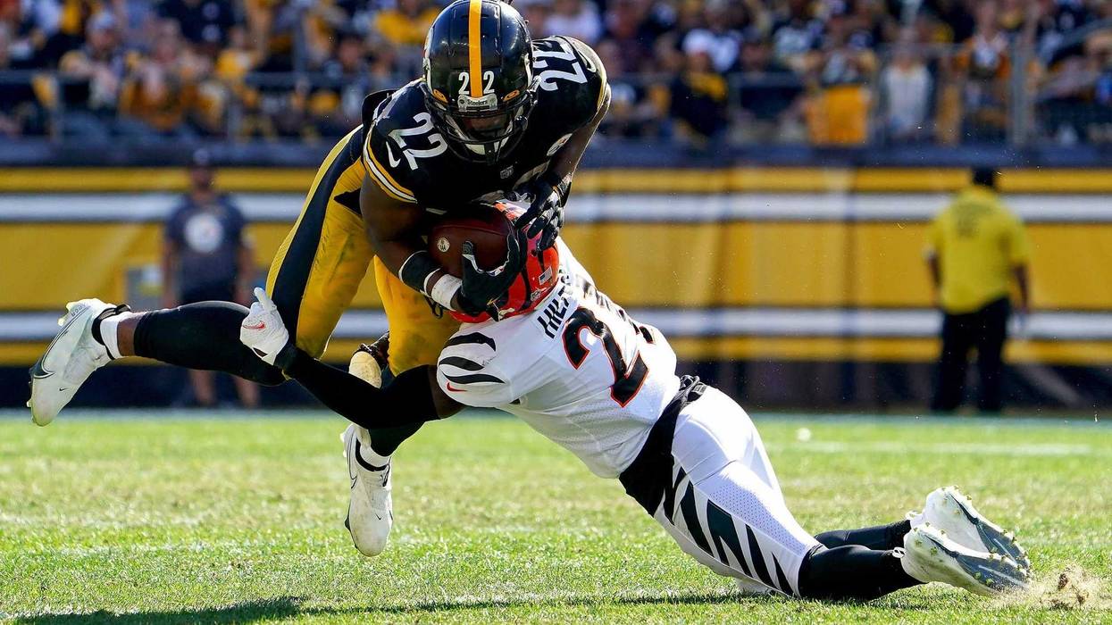 Najee Harris tackled