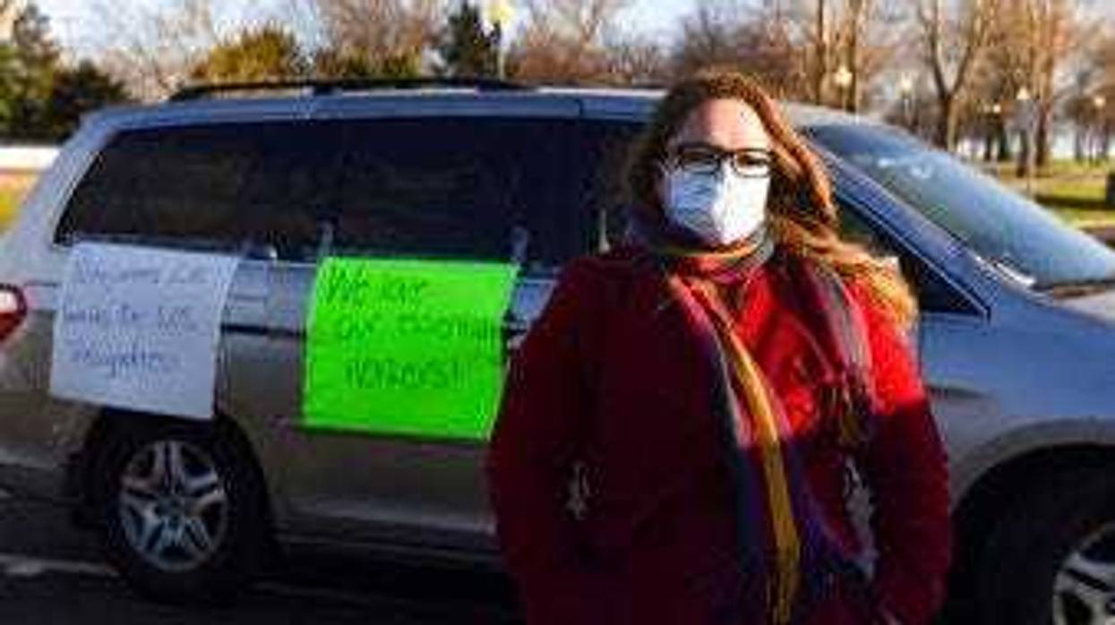Nancy Reynoza organized a protest in solidarity with Smithfield Food, Inc. employees after many workers complained of unsafe working conditions due to the COVID-19 outbreak in Sioux Falls, S.D. (Erin Bormett/The Argus Leader via AP)