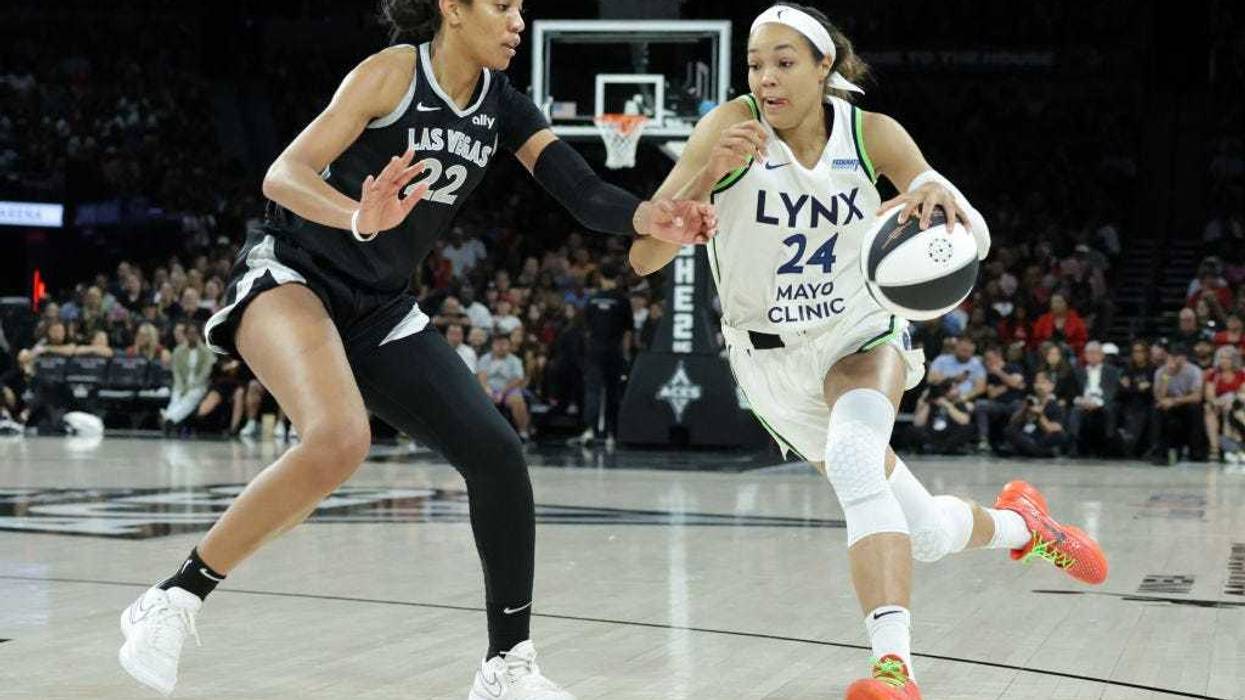 Napheesa Collier #24 of the Minnesota Lynx drives against A'ja Wilson #22 of the Las Vegas Aces in the second quarter of their game at Michelob ULTRA Arena on June 11, 2024 in Las Vegas, Nevada.