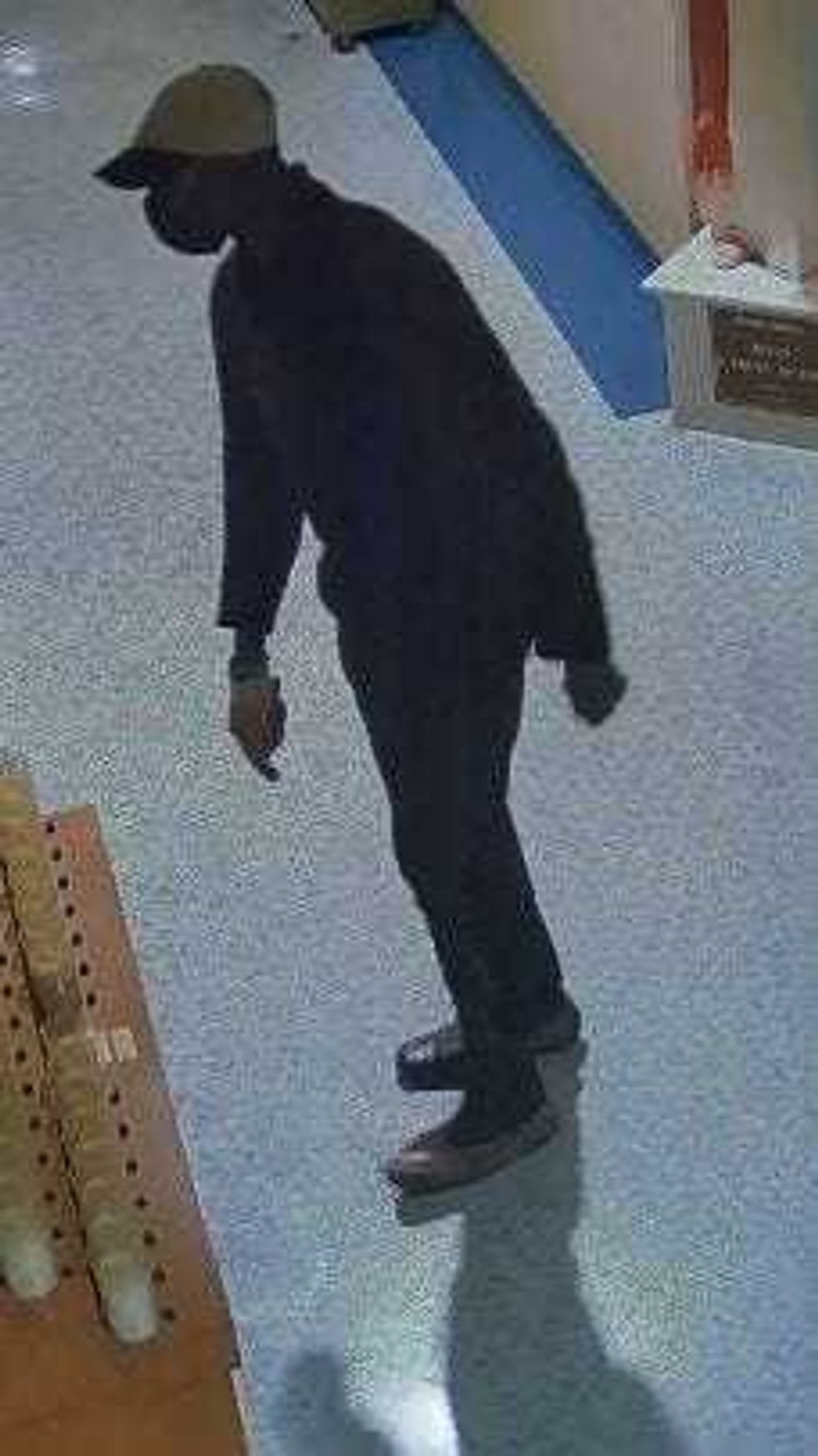Nassau County Police released on Thursday surveillance images of a burglar who robbed the donation box of a Long Island Catholic church after breaking and entering, in hopes that someone recognizes him.