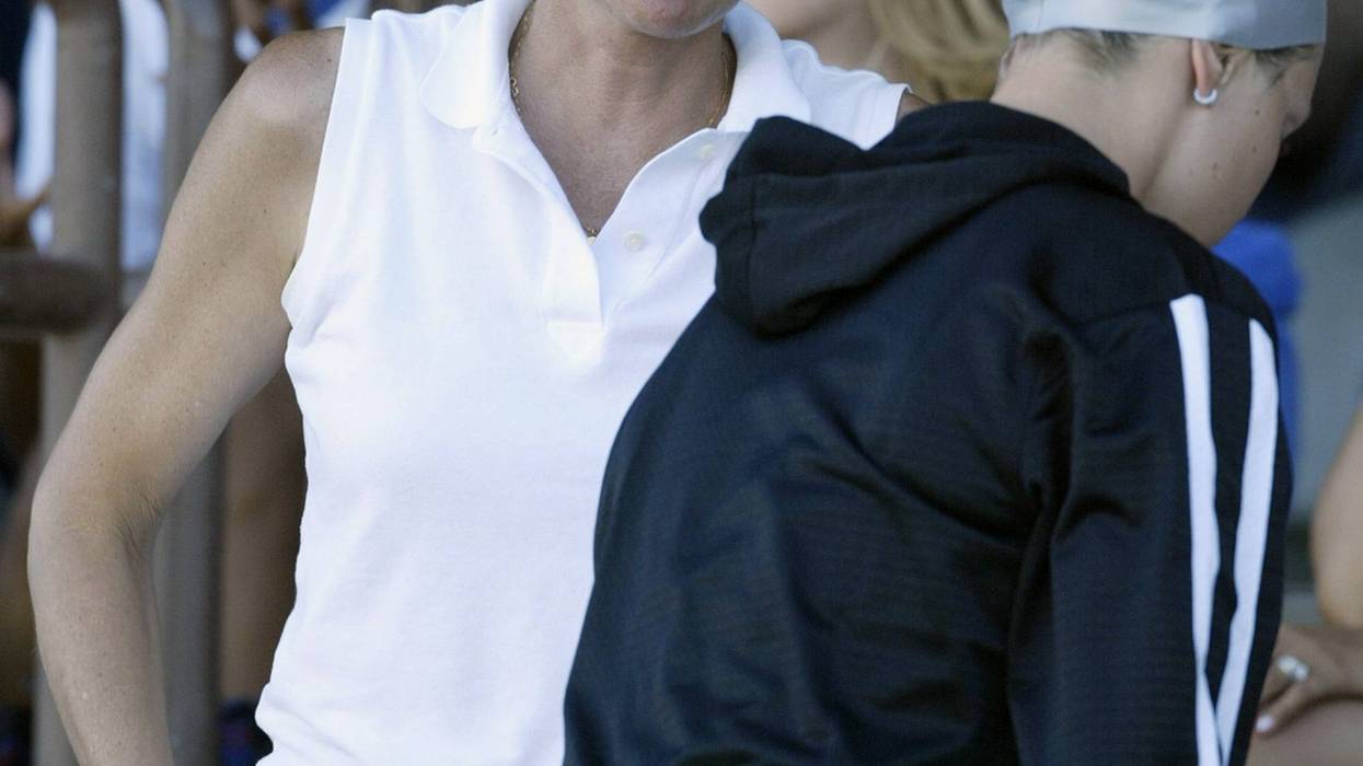 Natalie Coughlin's coach Teri McKeever talks to her before the finals of the womens 100 meter backstroke during the 36th Santa Clara International Swim Meet at the George Haines International Swim Center on June 28, 2003 in Santa Clara, California.