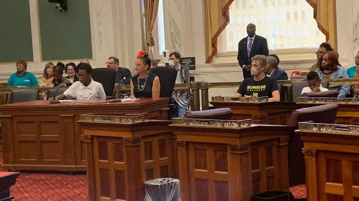 Natalie Felix DiDonato with a young rec center user testifying before council