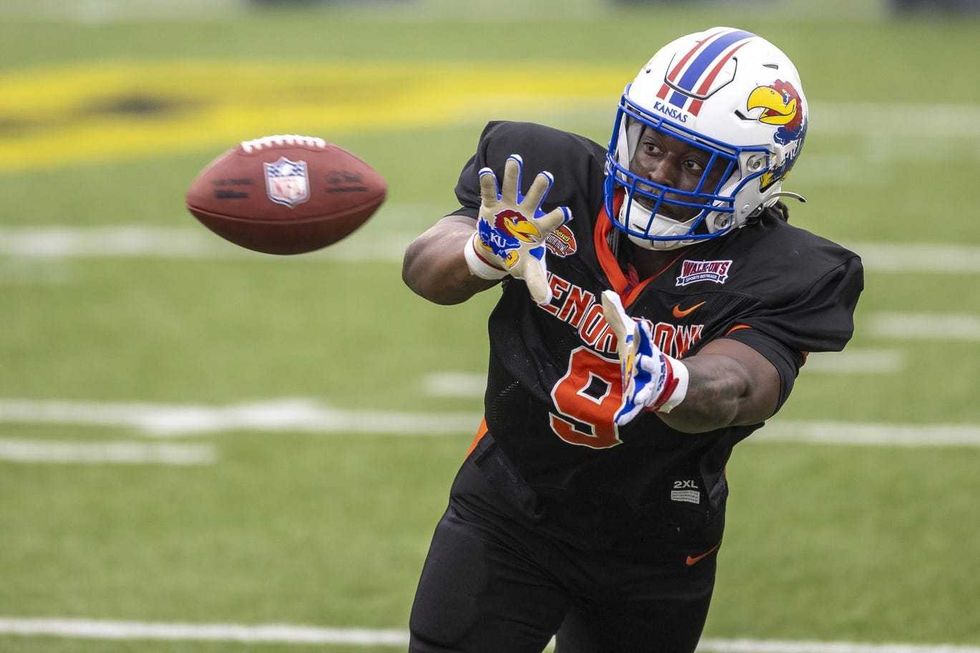 National defensive lineman Lonnie Phelps Jr of Kansas (9) practices during the third day of Senior Bowl week at Hancock Whitney Stadium in Mobile.