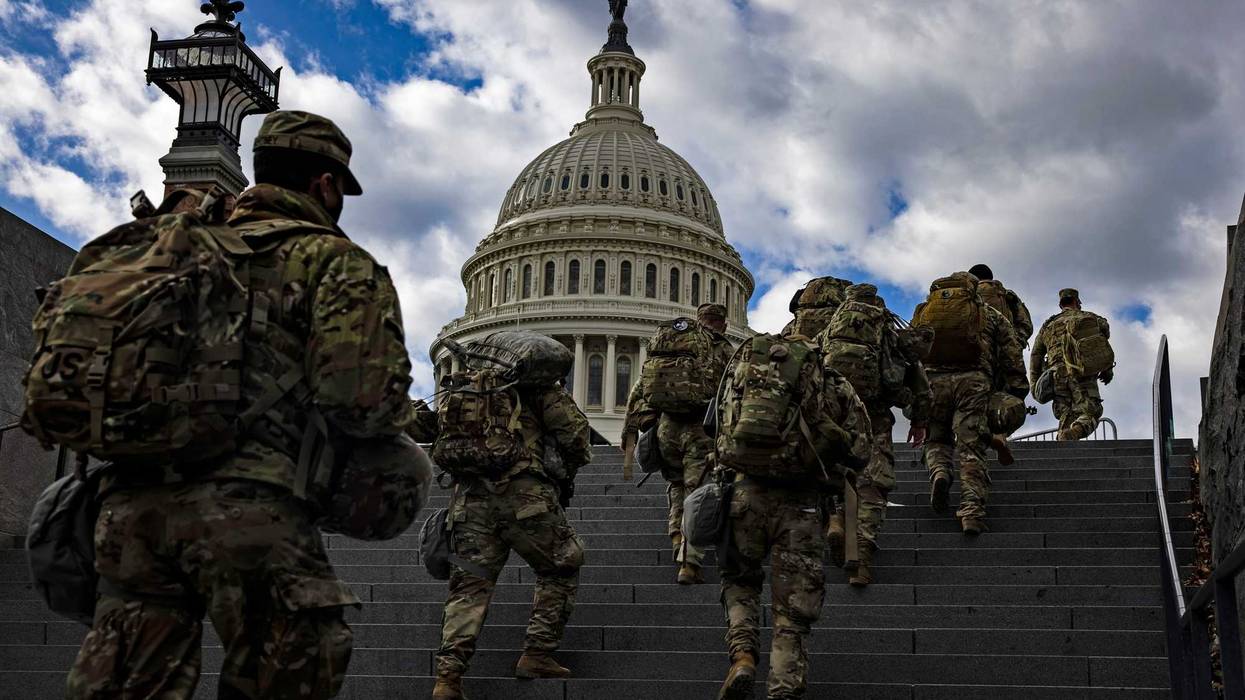 National Guard soldier head to the east front of the U.S. Capitol from the Capitol Visitors Center on January 17, 2021 in Washington, DC. After last week's riots at the U.S. Capitol Building, the FBI has warned of additional threats in the nation's capital and in all 50 states. According to reports, as many as 25,000 National Guard soldiers will be guarding the city as preparations are made for the inauguration of Joe Biden as the 46th U.S. President.