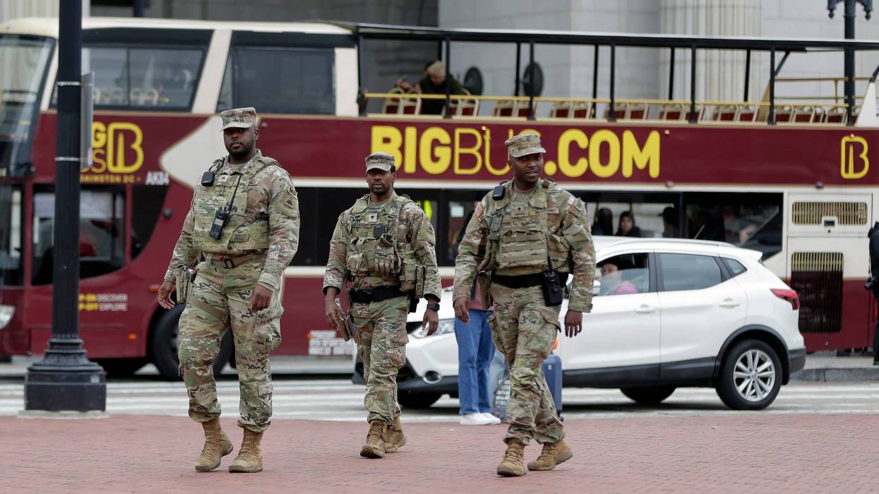 National Guard soldiers patrol at Union Station, Tuesday, Oct. 28, 2025, in Washington.