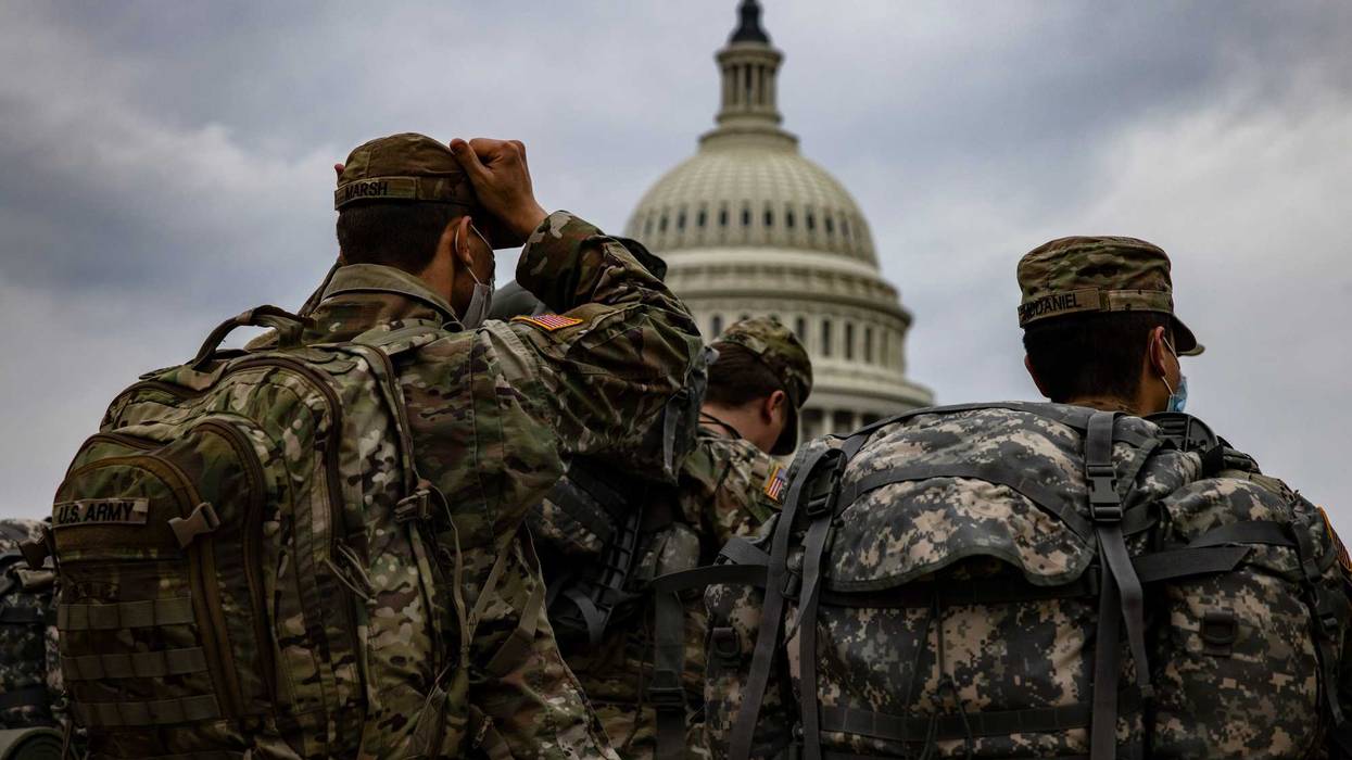 National Guard soldiers prepare for their guard shifts at the U.S. Capitol building on January 15, 2021 in Washington, DC. Due to security threats following last week's storming of the U.S. Capitol by a pro-Trump mob, law enforcement agencies have increased security measures along the National Mall and much of downtown Washington, DC, essentially closing down the Mall a week ahead of President-elect Joe Biden's inauguration.
