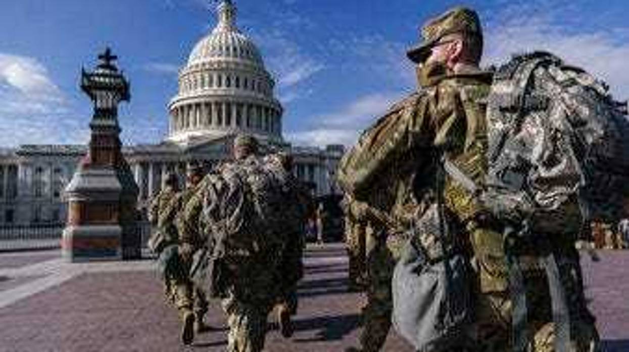 National Guard troops reinforce security around the U.S. Capitol ahead of expected protests leading up to President-elect Joe Biden's inauguration. (AP Photo/J. Scott Applewhite)
