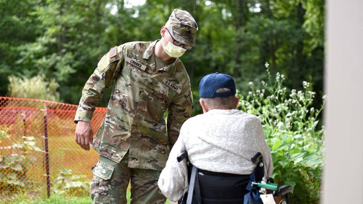 National Guard work with veterans at the Michigan Veteran Homes