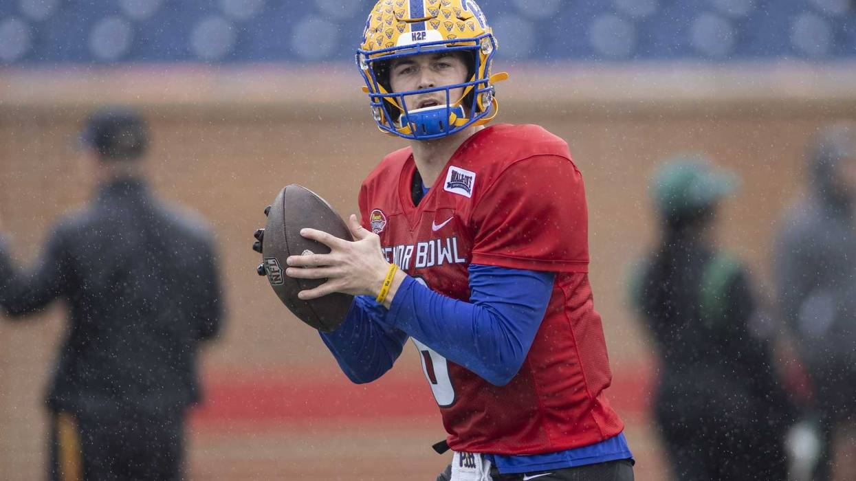 National quarterback Kenny Pickett of Pittsburgh (8) looks to throw during National practice for the 2022 Senior Bowl