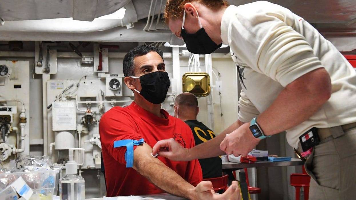 Navy Capt. Carlos Sardiello, commanding officer of the aircraft carrier USS Theodore Roosevelt
