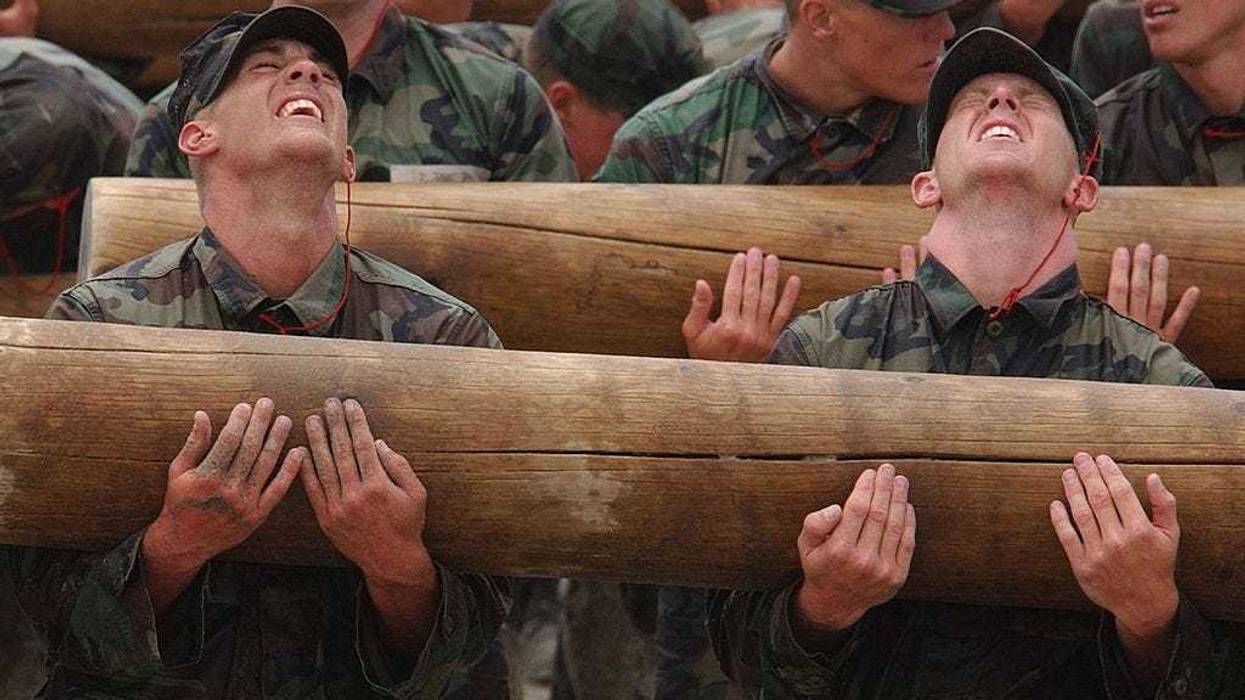 Navy SEALs students participate in Log PT (physical training) during "Hell Week" in Coronado, California.