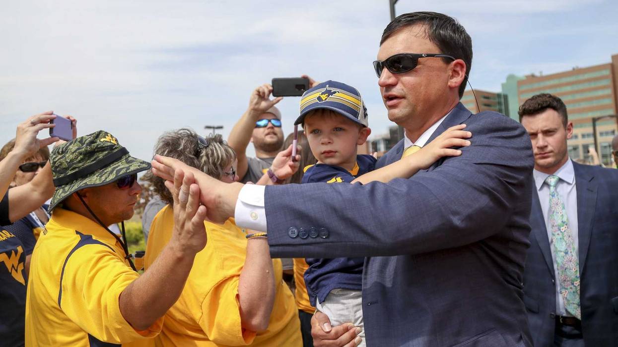 Neal Brown on sidelines