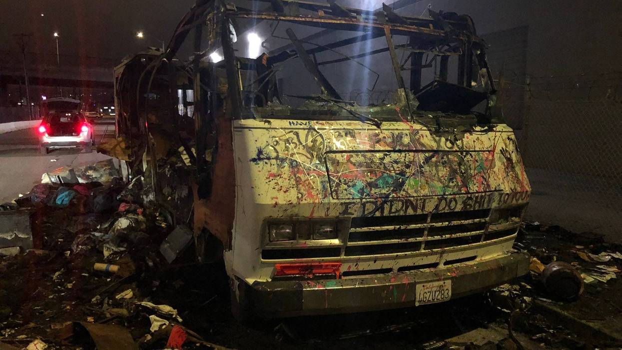 Nearly a dozen vehicles caught fire Tuesday morning under Interstate-880 in Oakland at a large homeless encampment.
