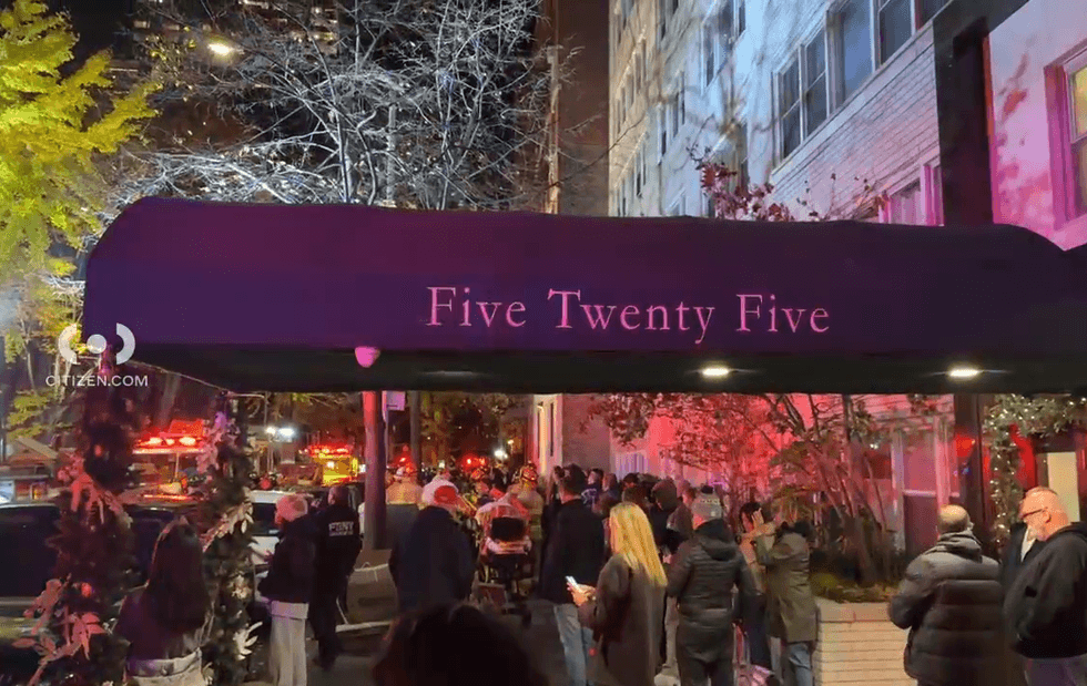 Neighbors watched from across the street as the fire engulfed the building