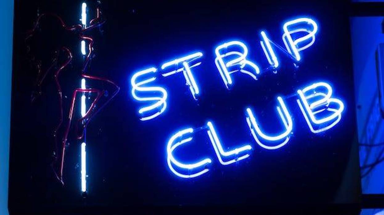 Neon strip club sign
