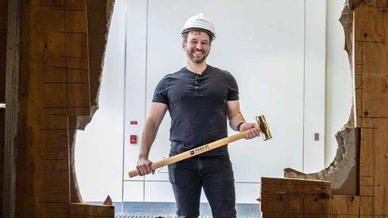 Nerd Street Gamers CEO John Fazio knocks out a wall, officially beginning construction on a new 40,000-square foot esports facility on North Broad Street.