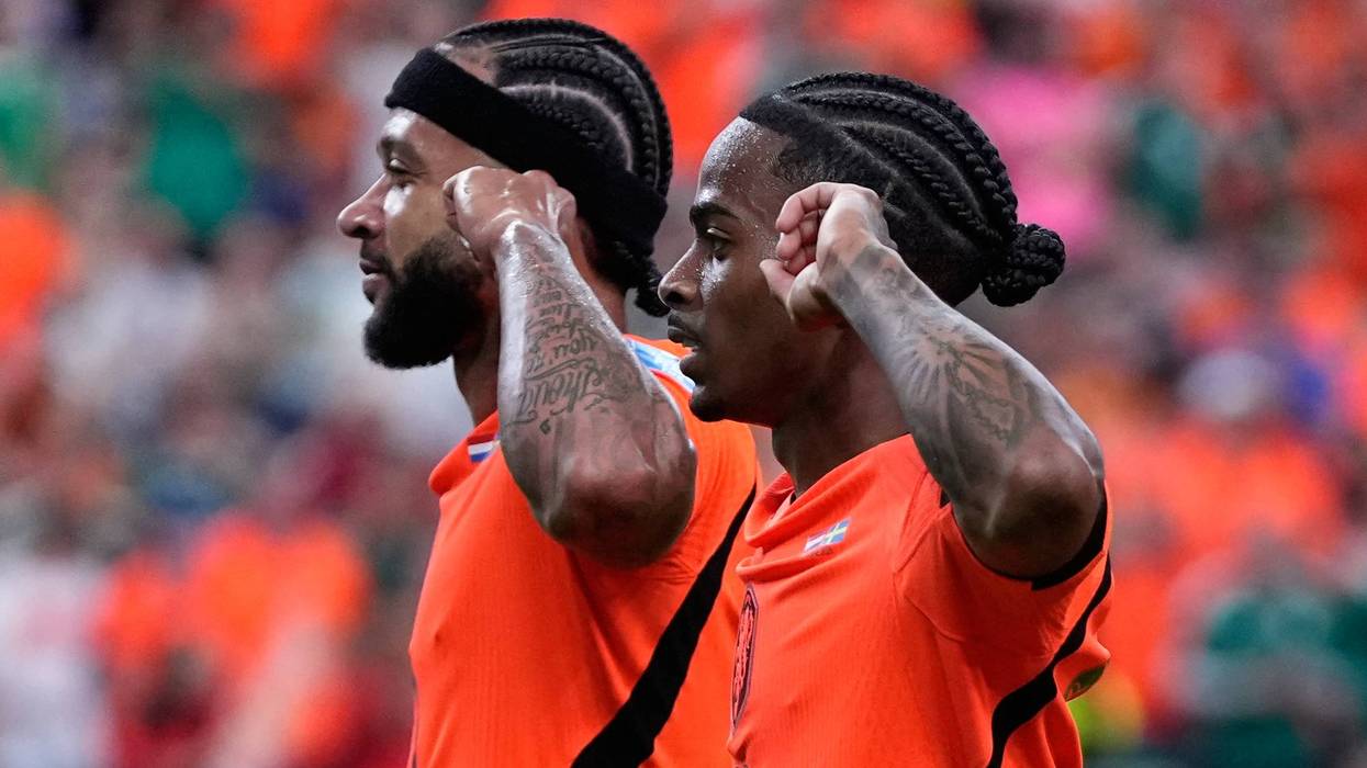 The Dutch roll in the rain to a 3-1 win over Tunisia in Kansas City