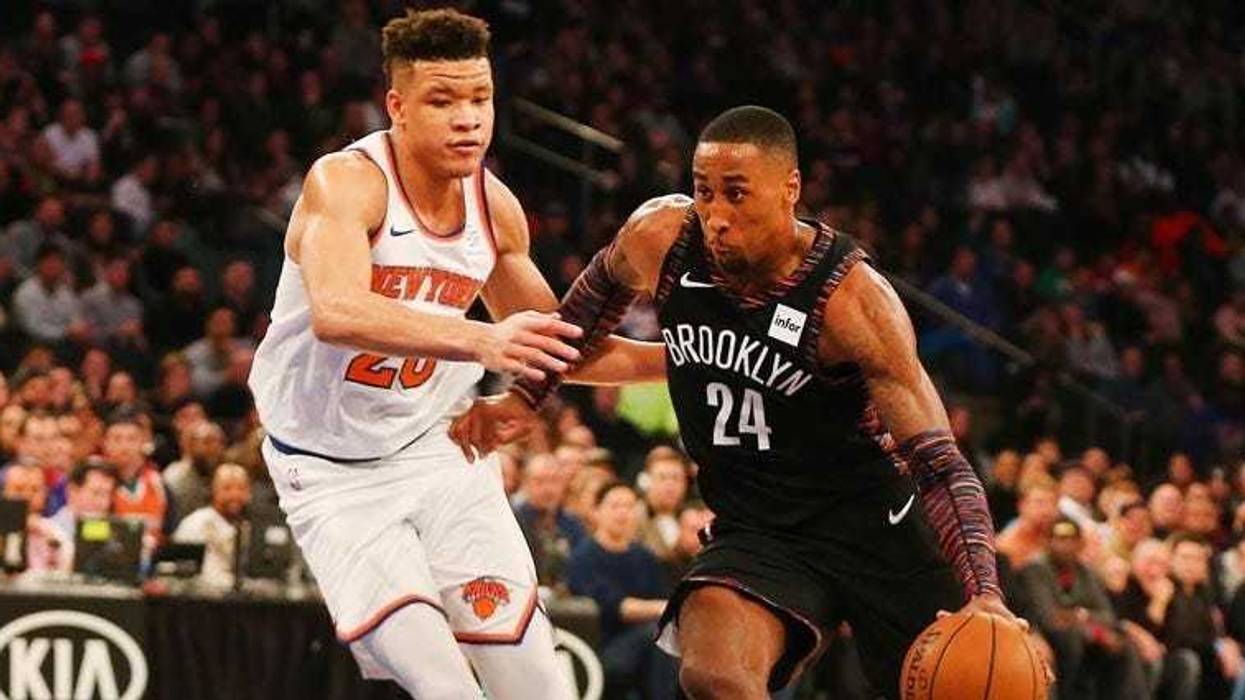 Nets forward Rondae Hollis-Jefferson dribbles the ball against Knicks forward Kevin Knox on Dec. 8, 2018, at Madison Square Garden.